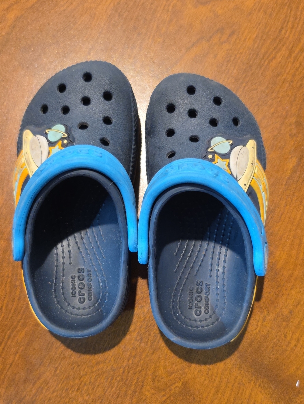 CROCS Kids Navy Clogs with Bright Blue Strap and Space Accent